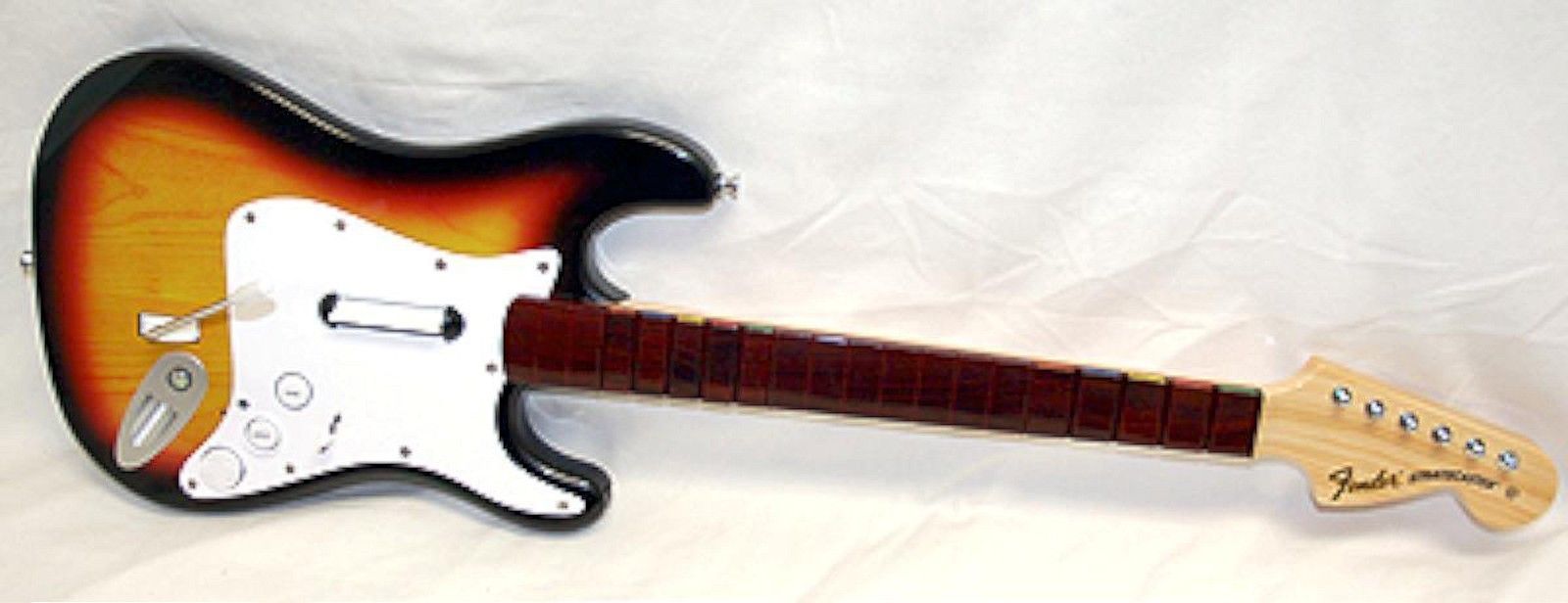 WII: ROCK BAND 2 GUITAR - FENDER STRATOCASTER - STARBURST WITHOUT RECEIVER (USED) WII: ROCK BAND 2 GUITAR - FENDER STRATOCASTER - STARBURST WITHOUT RECEIVER (USED)